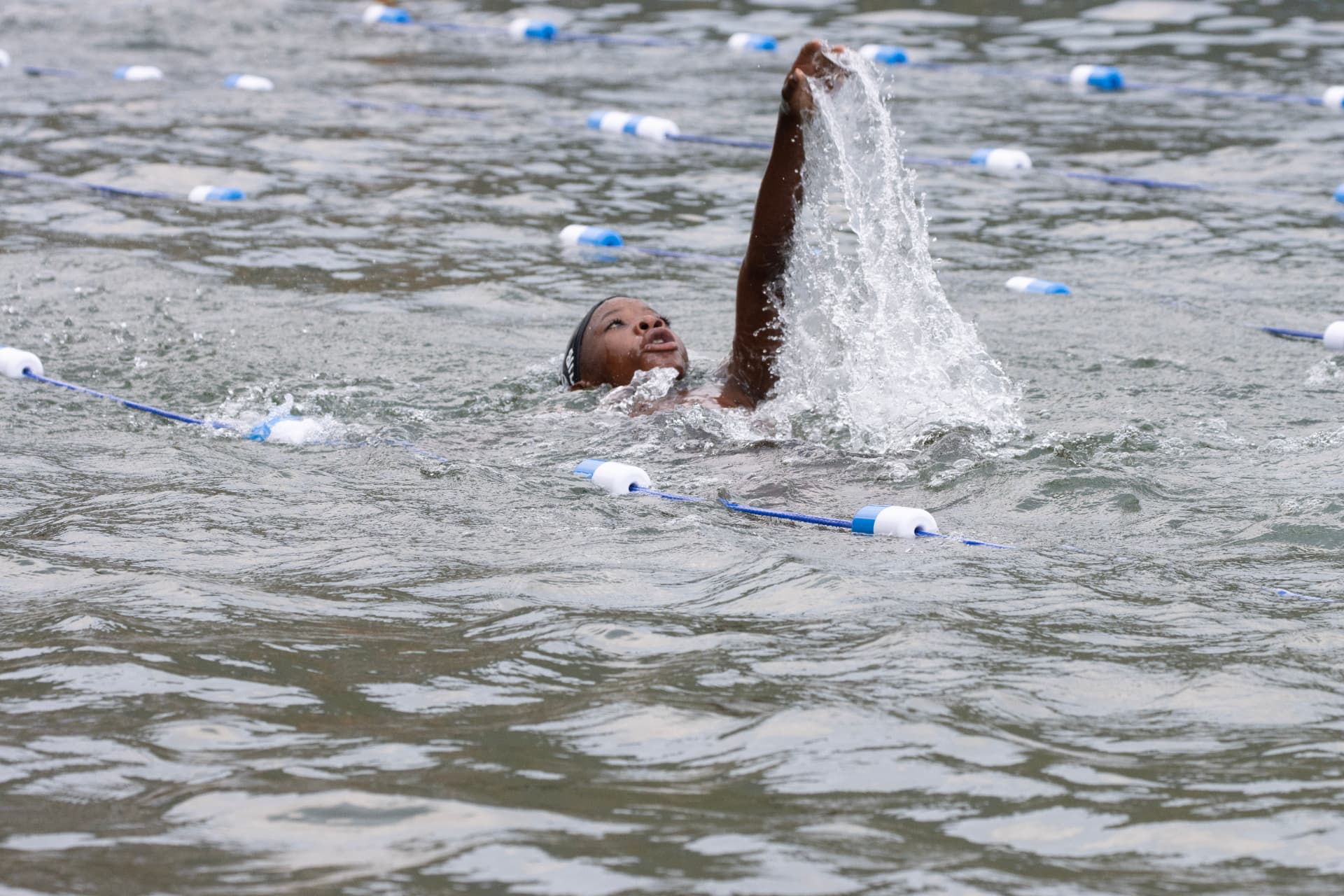 Boy swimming backstroke