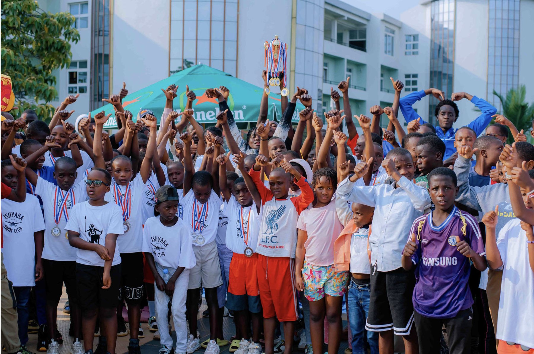 Swimmers celebrating at the Nyamata competition